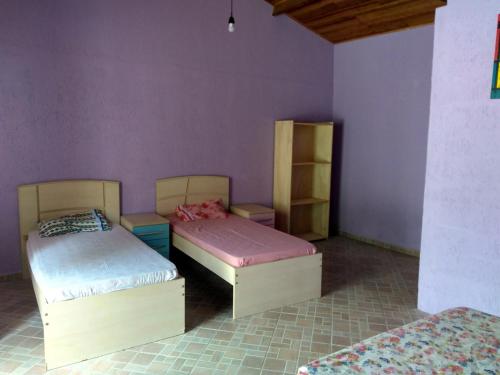 Una cama o camas en una habitación de Recanto da Paz Fyona