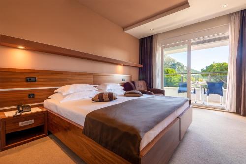 Posteľ alebo postele v izbe v ubytovaní Hotel Plaža