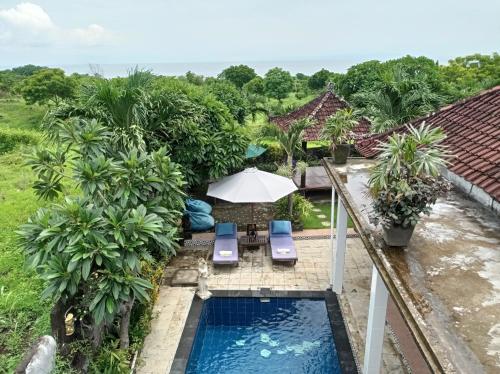 Бассейн в Khrisna Sunrise Homestay Tulamben или поблизости