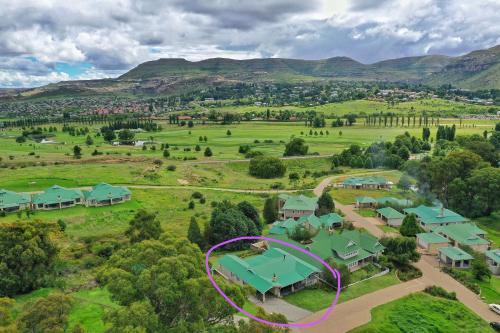 an aerial view of a home with a purple circle around it at Saints Rest in Clarens
