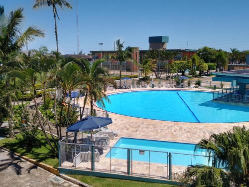 a view of a swimming pool at a resort at Colônia de Férias de Guaratuba in Guaratuba
