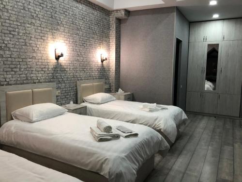 Un ou plusieurs lits dans un hébergement de l'établissement Flamenco Hotel