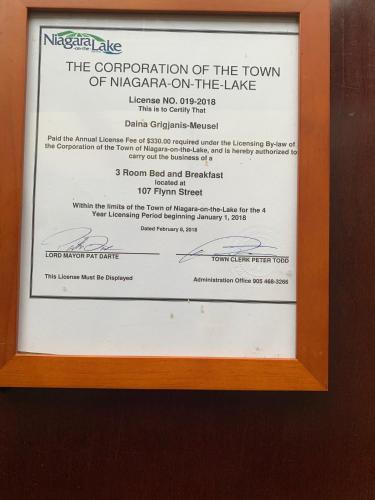 a framed picture of the documentation of the town of macarapa on the lake at Cedar Gables Bed & Breakfast in Niagara on the Lake