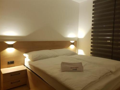 Postel nebo postele na pokoji v ubytování Apartments Mikic 2 Zlatibor
