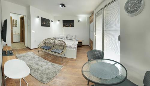 Postel nebo postele na pokoji v ubytování Bibi's Apartments