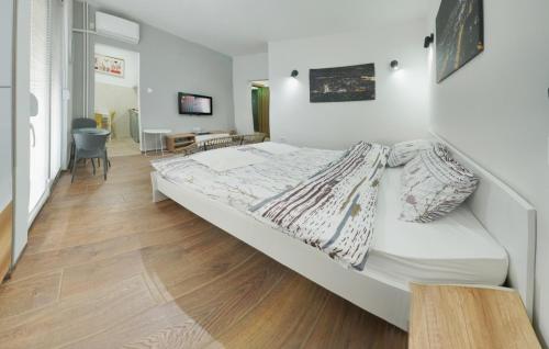 Säng eller sängar i ett rum på Bibi's Apartments