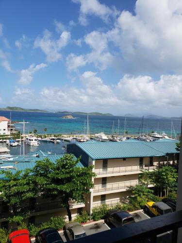 a view of a marina with boats in the water at Sapphire Village Condos in St Thomas