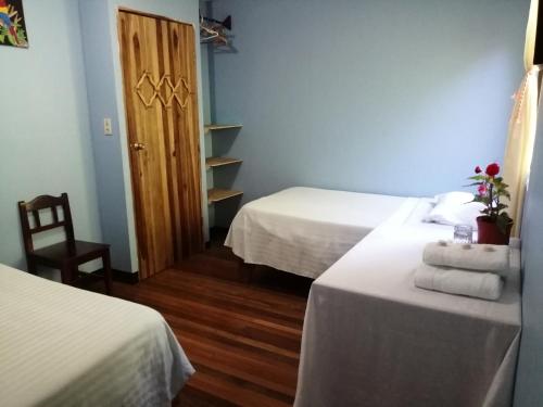 Katil atau katil-katil dalam bilik di Monte Los Lirios Lodge