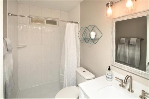 a bathroom with a toilet and a sink and a shower at NEW! Family Lake Havasu Home Close To Off-Roading And London Bridge! in Lake Havasu City