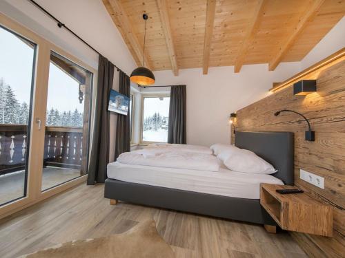 Llit o llits en una habitació de Top class chalet with 3 bathrooms near small slope