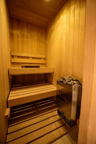a walk in sauna with a box in it at Hotel Madi in San Miguel de Allende