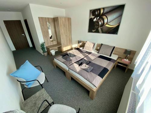 Postel nebo postele na pokoji v ubytování Apartmány Pelhřimov
