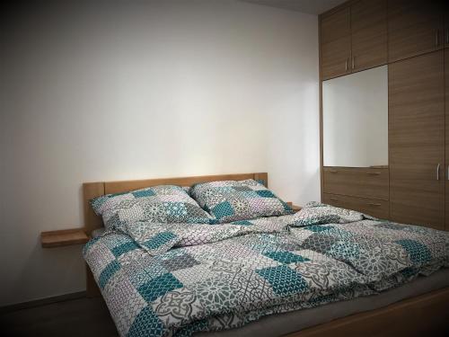 Posteľ alebo postele v izbe v ubytovaní Apartmán Svárov