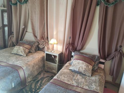 Postel nebo postele na pokoji v ubytování B&B Chambre Chante Cristal
