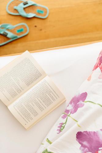 Una cama o camas en una habitación de Alpenkräuter Hotel Bären