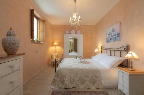 Katil atau katil-katil dalam bilik di Agriturismo Renello