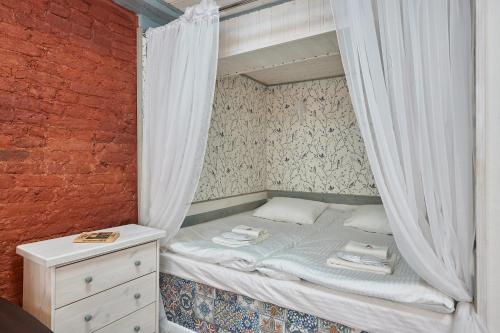 
Кровать или кровати в номере Исаакиевский Лофт
