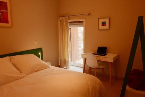 Llit o llits en una habitació de Le Hameau du Buron - "Le Petit Buron" - Option SPA