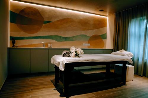Postel nebo postele na pokoji v ubytování Ayuryoga Wellnesshotel