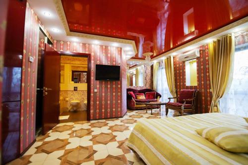 Postel nebo postele na pokoji v ubytování Prestige apart-hotel