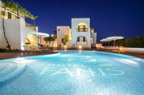 a large swimming pool in front of a building at Hotel Fanis in Agia Anna Naxos