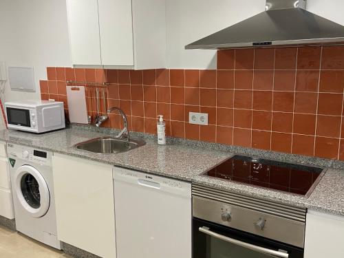 Dapur atau dapur kecil di Os Arcos - Apartamentos Turísticos