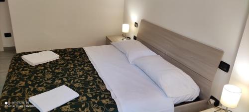 Ein Bett oder Betten in einem Zimmer der Unterkunft Sweet Napoli