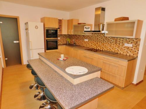 a kitchen with a counter top in a room at Chalupa Staré Buky in Staré Buky