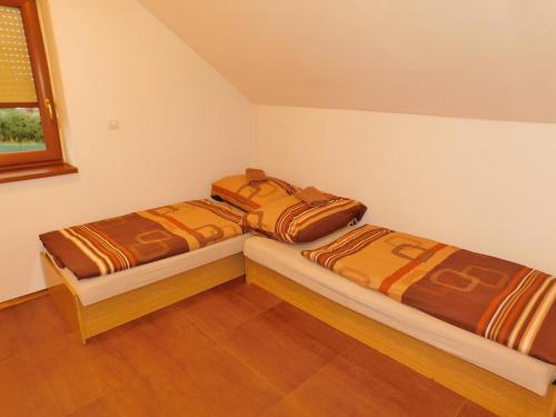 Postel nebo postele na pokoji v ubytování Chalupa Staré Buky
