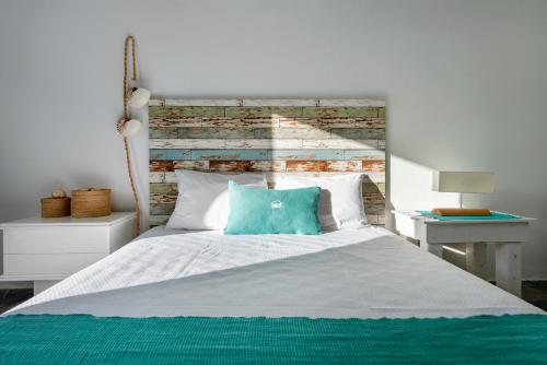 A bed or beds in a room at Villa Veni