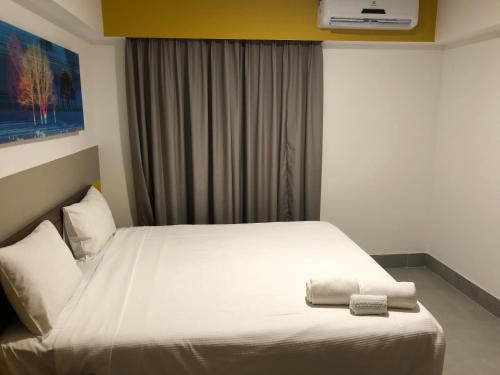 Postelja oz. postelje v sobi nastanitve Apto Master em Olímpia Park Resort