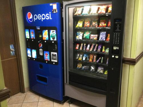a refrigerator filled with lots of food and drinks at Baymont by Wyndham Bridgeport/Frankenmuth in Bridgeport
