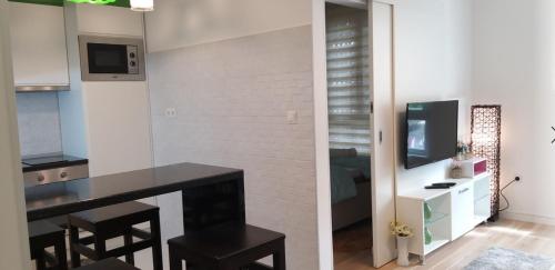 Apartman Amorにあるテレビまたはエンターテインメントセンター