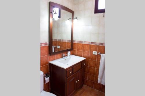 Ванная комната в Casa El Nisperero