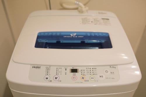 a close up of a washing machine with at 谷町君 星ホテル 新深江59 in Osaka