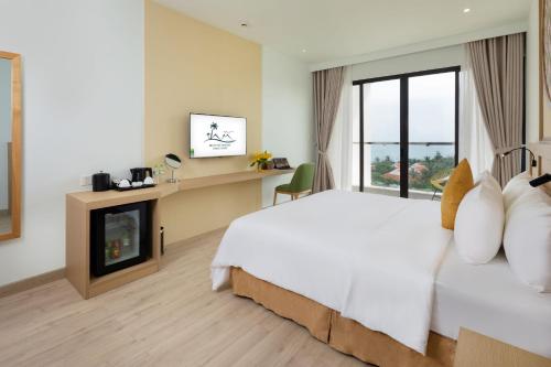 TV a/nebo společenská místnost v ubytování Hoan My Resort - Ninh Chu