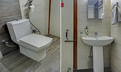 a bathroom with a toilet and a sink at Treebo Umal Homestay Ganeshguri in Guwahati