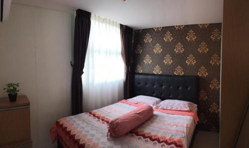 Ένα ή περισσότερα κρεβάτια σε δωμάτιο στο One Bed Room Apartment, Intermark BSD