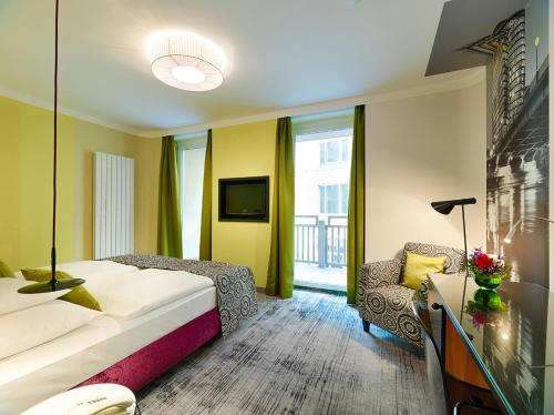 Een bed of bedden in een kamer bij Hotel Capricorno