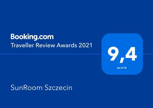 a blue box with the text travelling review awards at SunRoom Szczecin in Szczecin