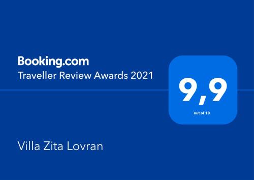 a blue box with the text traveler review awards at Villa Zita Lovran in Opric