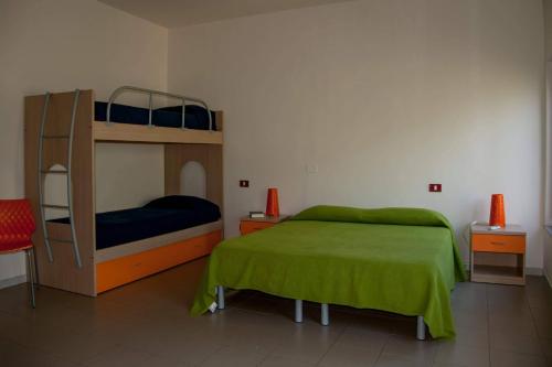 A bunk bed or bunk beds in a room at Casa San Giuseppe - Isola d'Elba