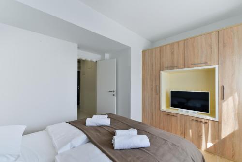 Ένα ή περισσότερα κρεβάτια σε δωμάτιο στο Resort Mirakul