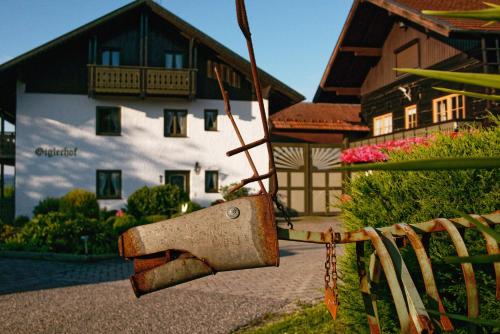 a wooden fence in front of a building at Giglerhof in Bad Birnbach