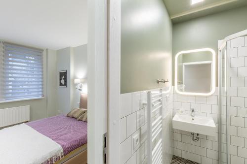 Koupelna v ubytování Art & Comfort Rooms