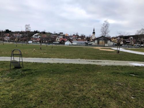 a park with a playground in the middle of a field at Apartment in Gelb, mit Balkon, Kamin, 50 Schritte zu Radweg, ideal for Long Stay, 4 Singles in Single Rooms in Mainstockheim