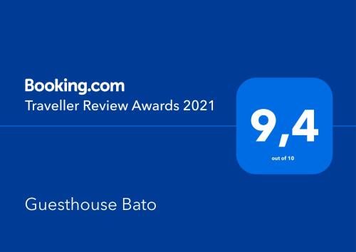 a blue box with the text traveler review awards at Guesthouse Bato in Virpazar