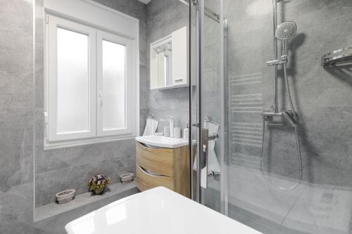 Kúpeľňa v ubytovaní Apartman DOWNTOWN DL