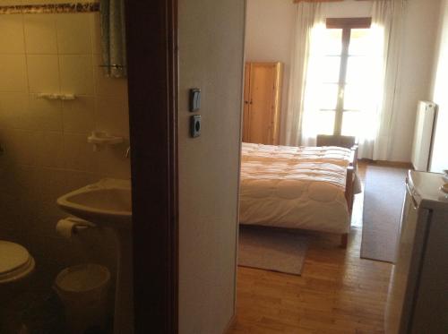 Voodi või voodid majutusasutuse Guesthouse Kontorizos toas