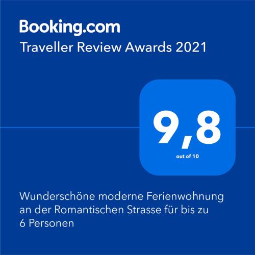 a screenshot of a phone with the text travelling review awards at Ferienwohnung im Aalbachtal - Uettingen bei Würzburg in Uettingen